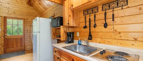Fridge, microwave, stovetop, coffee/tea maker