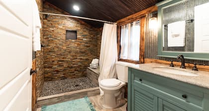 Vintage charm meets modern comfort in this historic 1850s cabin at Lake Hartwell