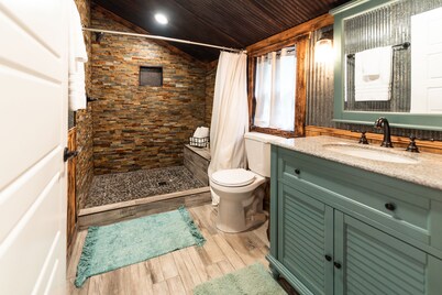 Vintage charm meets modern comfort in this historic 1850s cabin at Lake Hartwell