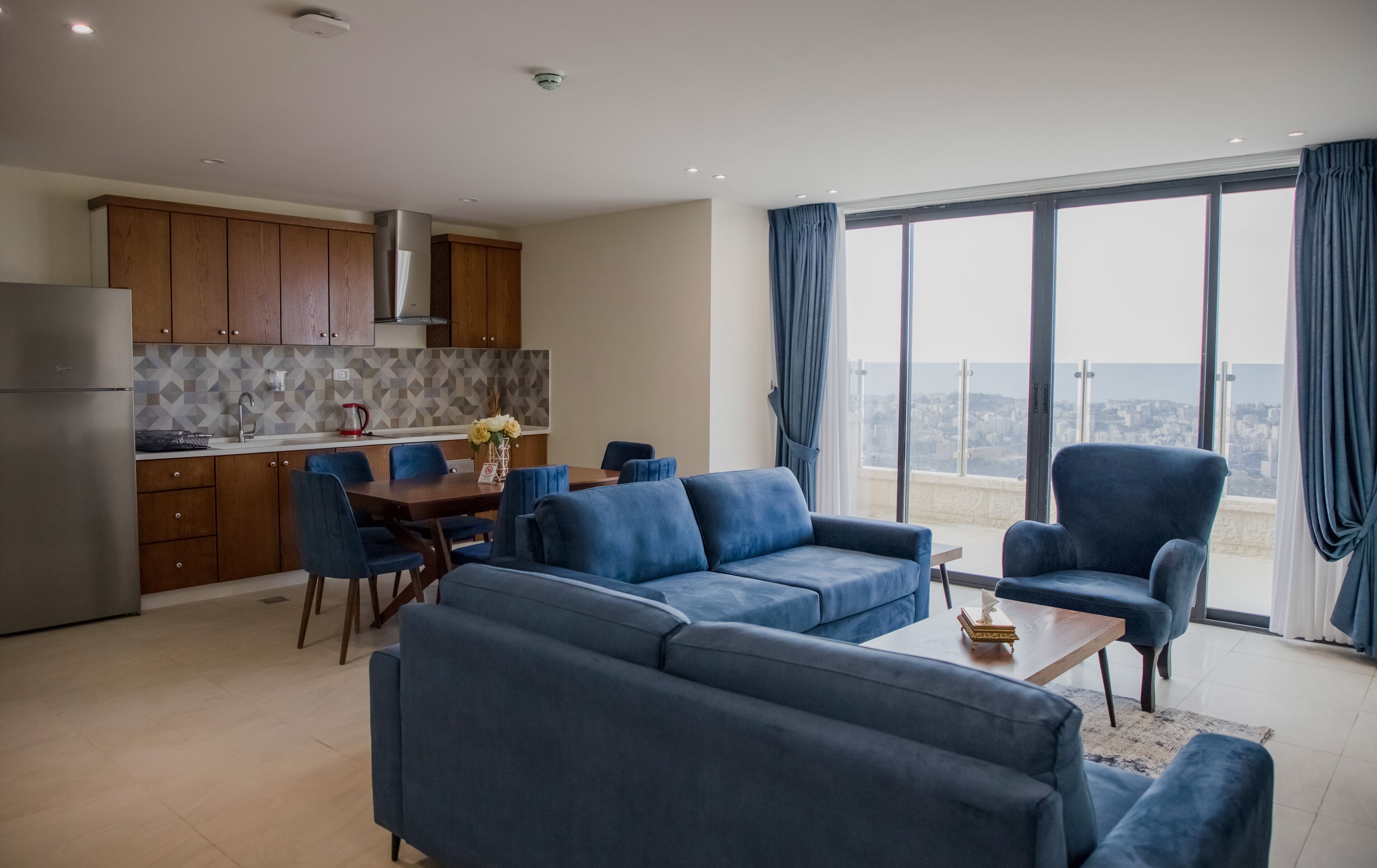 Family Suite | Private kitchen | Full-size fridge, stovetop, toaster oven, cookware/dishes/utensils