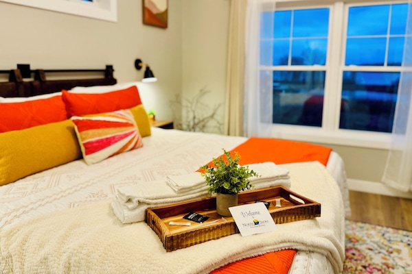 Primary bedroom 2 on main level with private full bathroom and the best views!