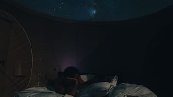 Experience the magic of stargazing from the comfort of your room, with a domed ceiling offering breathtaking views of the night sky.