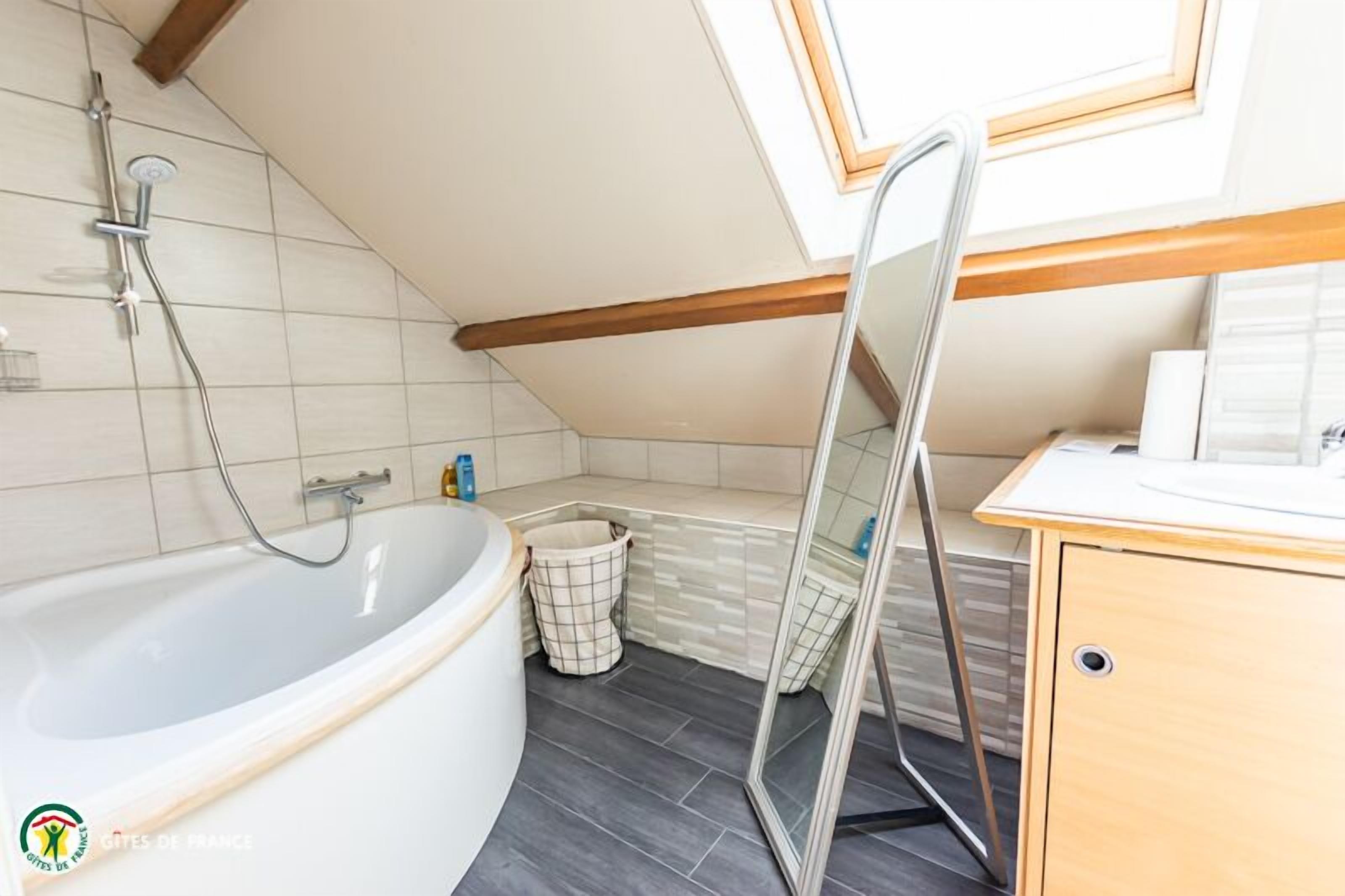 Bathtub, hair dryer, towels