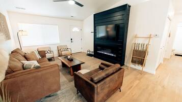 Smart TV, fireplace, books