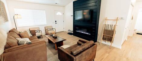 Smart TV, fireplace, books