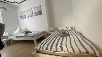 Basic Apartment, 3 Bedrooms | Laptop workspace, iron/ironing board, free WiFi