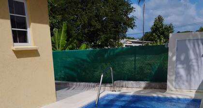 A modern and spacious house, steps to the beach with a private pool!!