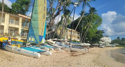 A modern and spacious house, steps to the beach with a private pool!!