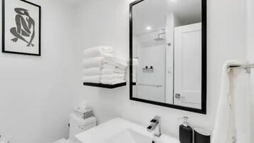 Hair dryer, towels, soap, shampoo