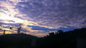 A sunset with clouds over a construction site. - Preferred Hotel (Shanghai Sheshan) (Shanghai)