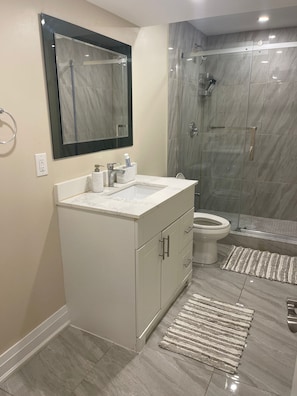 Shower, towels, soap, shampoo