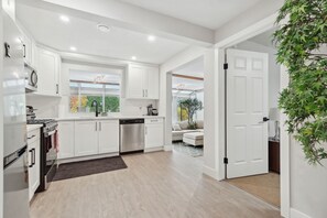 Private kitchen - Sunlit Suite, Hot Tub Haven (Calgary)