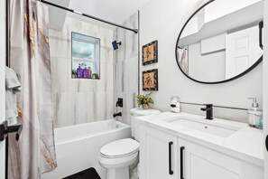 Hair dryer, towels, soap, toilet paper - Sunlit Suite, Hot Tub Haven (Calgary)