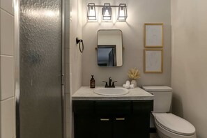 Bathtub, hair dryer, towels