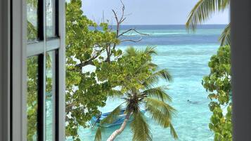 Family Room, Ocean View | 1 bedroom, iron/ironing board, free WiFi, bed sheets