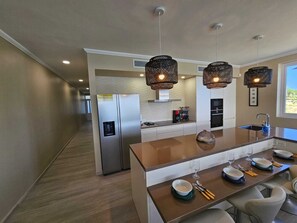 Fridge, microwave, oven, stovetop - Little bit of Heaven Aruba - Beachfront Condo at Rodgers Beach  (San Nicolas)