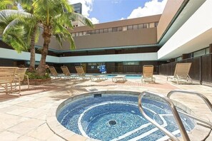 Outdoor pool, a heated pool - 1BR Ocean/Sunset View w/Parking (Honolulu)