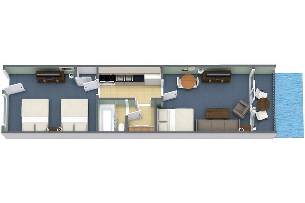 Plano de un cuarto de hotel con cocina, dos dormitorios, un baño y un balcón con vista al mar.