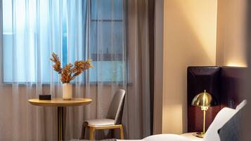 Hypo-allergenic bedding available, minibar (free items), in-room safe