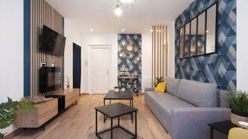 TV, fireplace, books