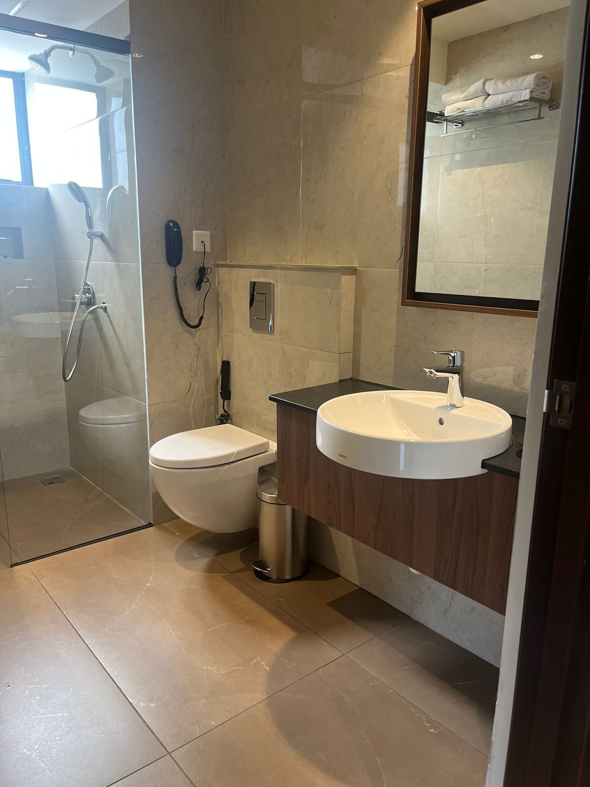 deluxe room | bathroom | shower, hydromassage showerhead, designer toiletries, hair dryer
