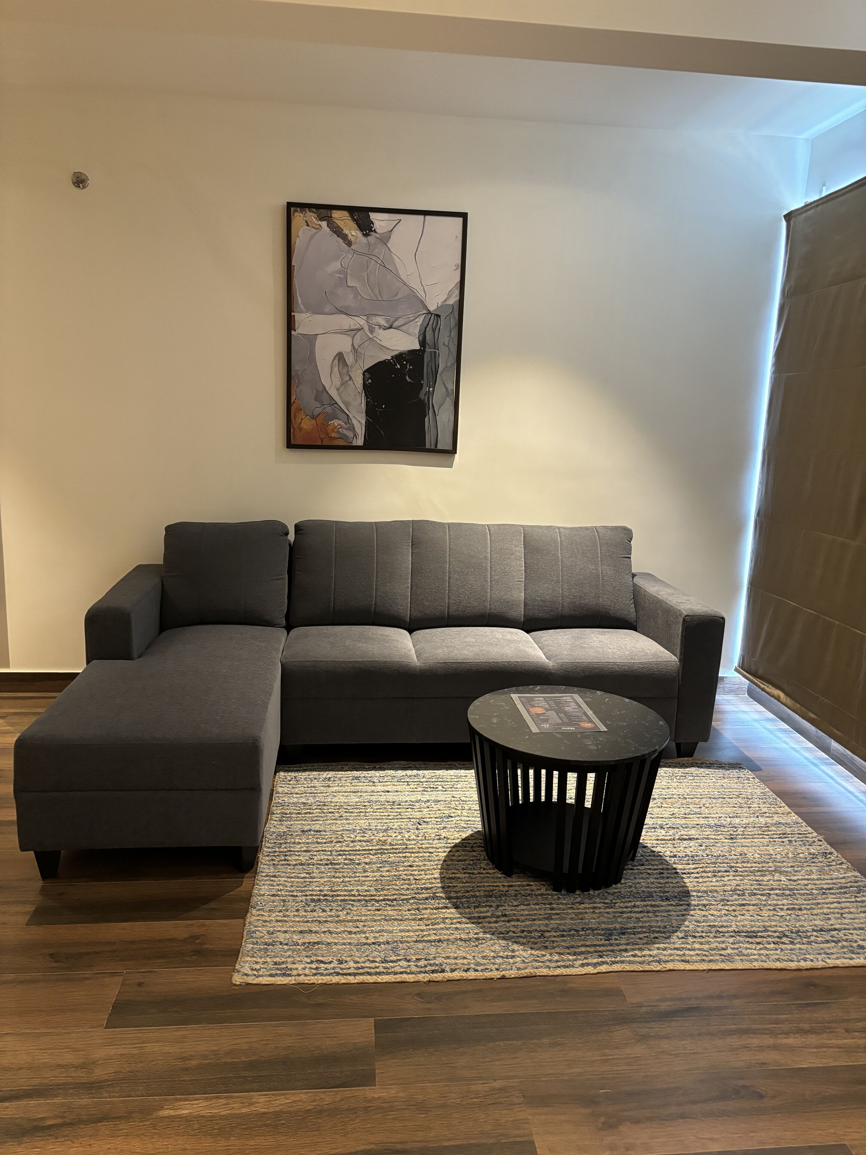 executive airport view rooms with free airport pick up/drop | living area | 81-cm smart tv with digital channels, pay films, streaming services