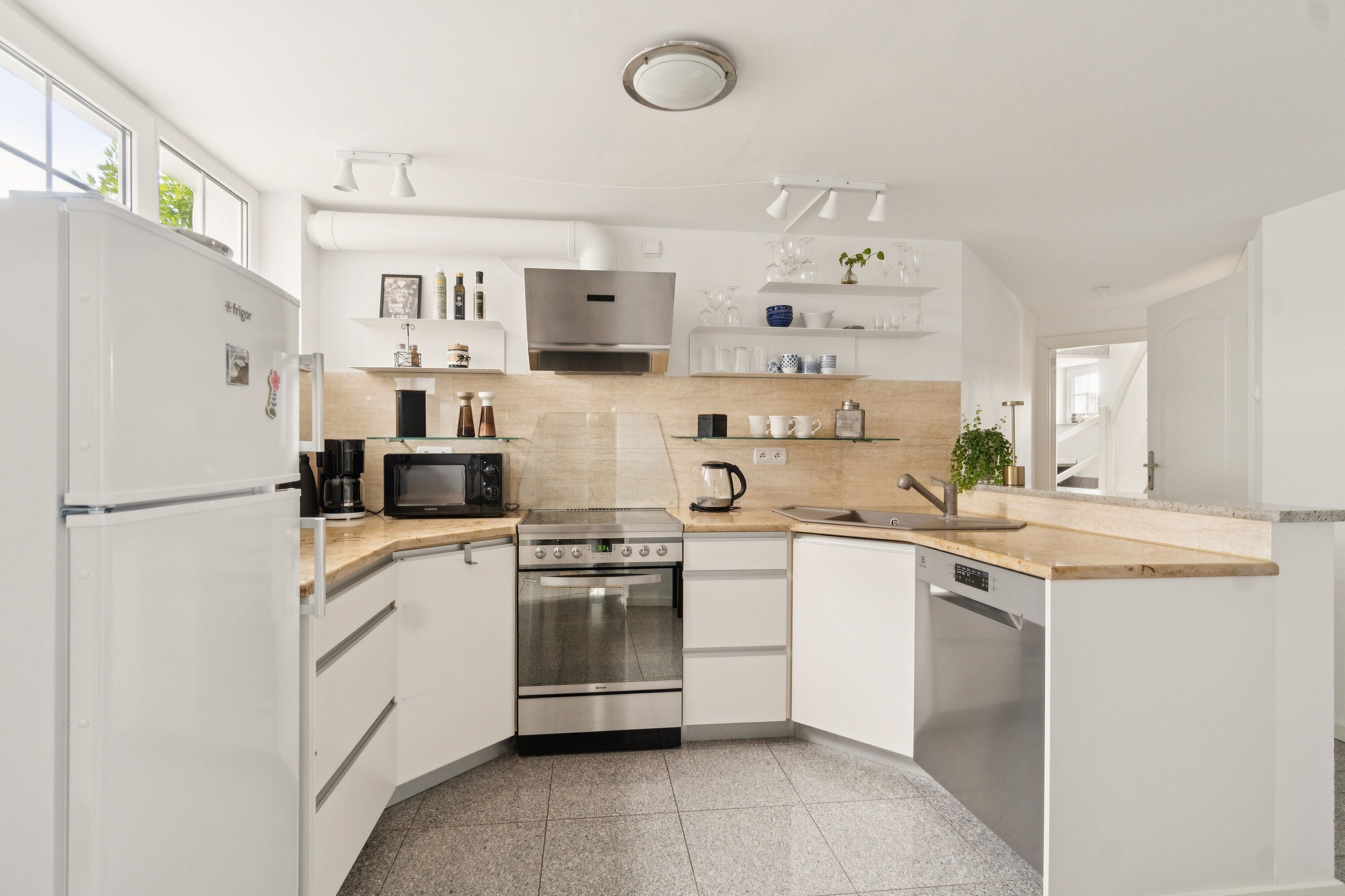 Apartment, 2 Bedrooms | Private kitchen | Microwave, coffee/tea maker, electric kettle, highchair