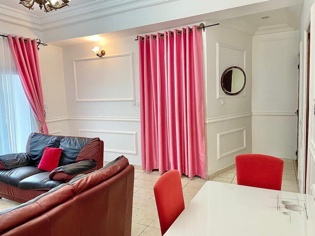 Premium Apartment | Living area | 55-inch Smart TV with cable channels, Netflix, streaming services