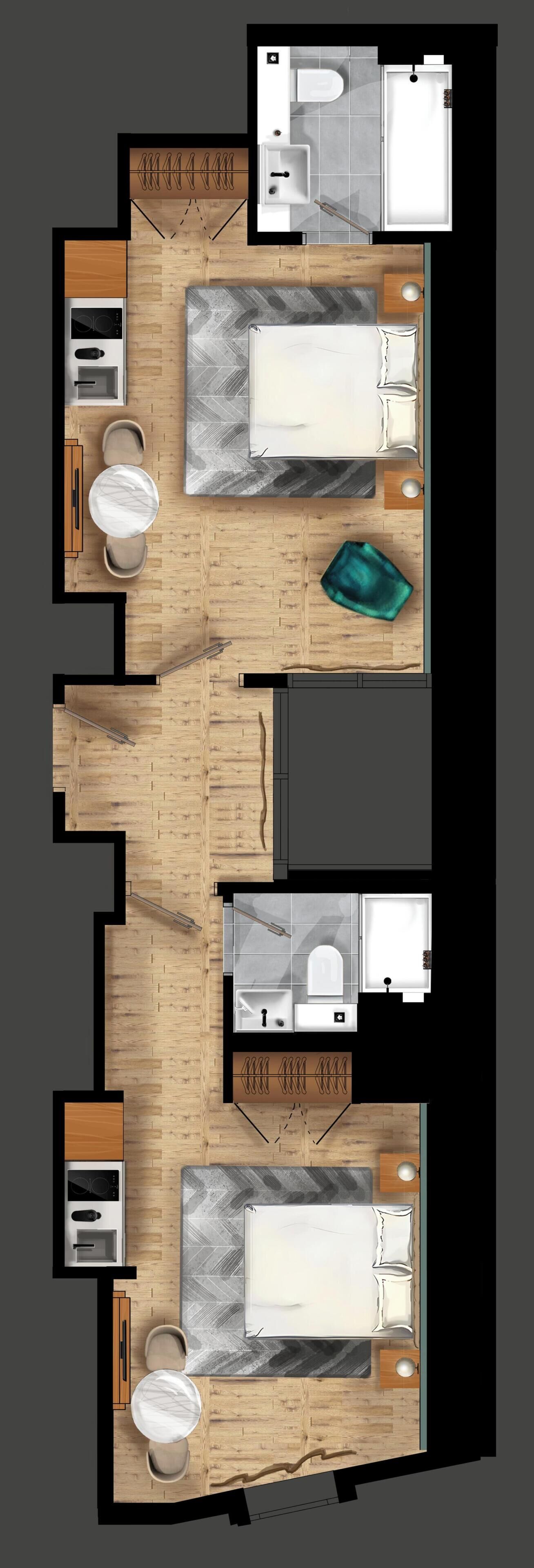 A hotel room layout with a bed, two bathrooms, a small kitchen area, and a seating area.