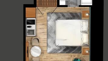 A hotel room layout with a bed, a bathroom, a kitchenette, and a seating area.