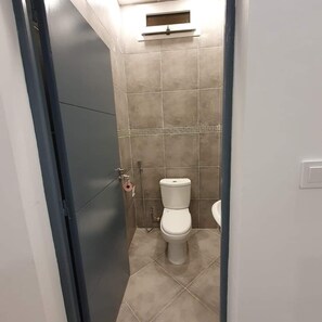 Hair dryer, towels, soap, toilet paper