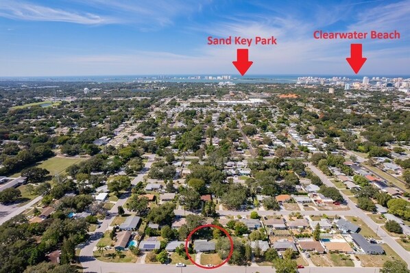 An aerial view of a residential area with marked locations for Sand Key Park and Clearwater Beach. - Private Heated Salt Water Pool Oasis • 10 Mins to Clearwater Beach (Clearwater)