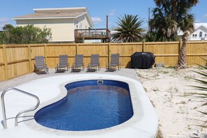 pool and fenced-in courtyard