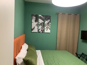 1 chambre, fer et planche Ă repasser, Wi-Fi, draps fournis