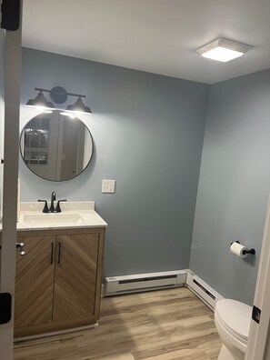 Shower, towels, soap, toilet paper