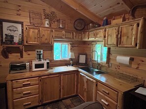 Coffee/tea maker, fridge, microwave, stovetop