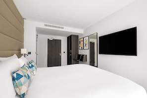 Premium bedding, memory foam beds, in-room safe, desk