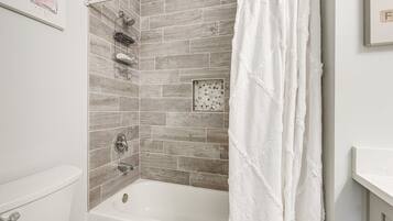 Hair dryer, towels, soap, toilet paper