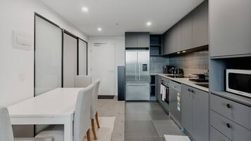 Coffee/tea maker, fridge, microwave, oven