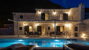 A stone villa with a pool, outdoor seating, and a balcony. - Amazing home in Gruda (Gruda)