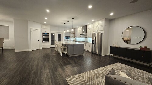 5 bed 2.5 bath w/ detached game room. Open concept, spacious for large groups.