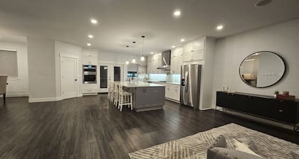 5 bed 2.5 bath w/ detached game room. Open concept, spacious for large groups.