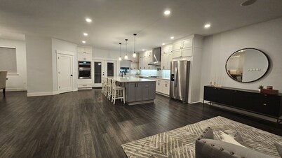 5 bed 2.5 bath w/ detached game room. Open concept, spacious for large groups.