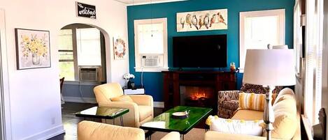 Smart TV, fireplace, books