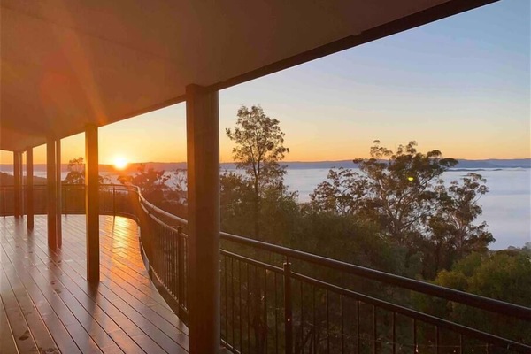 Our curved veranda let’s you feel like you are on top of the world.