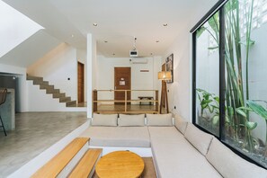 Exclusive Villa | Living area | 43-inch Smart TV with digital channels, Netflix, streaming services