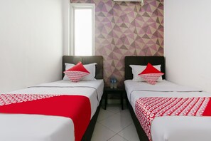 Standaard Twin kamer | Een bureau, gratis wifi, beddengoed