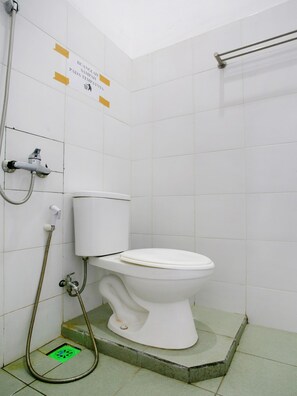 Ducha, bidé, toallas y jabón