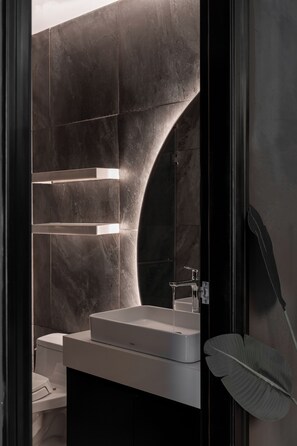 Hair dryer, bidet, towels, soap