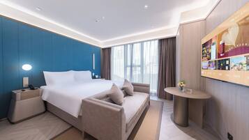 Premium bedding, free minibar, desk, soundproofing